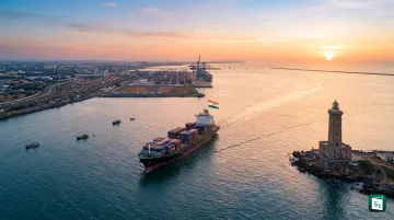 A cargo vessel at an Indian port with the Bharat Maritime Insurance Pool symbolizing sovereign-backed maritime insurance coverage