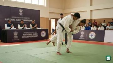Judo Federation of India logo and athletes in competition