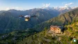 A cargo drone preparing for take-off to deliver mail in a mountainous area